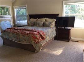 California King bed with Tempurpedic mattress and night stands and dresser.