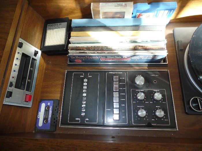 Vintage Magnavox stereo console w/record player, radio and 8 track player. Also have album storage inside cabinet