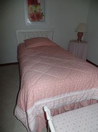 White twin bed and bedding