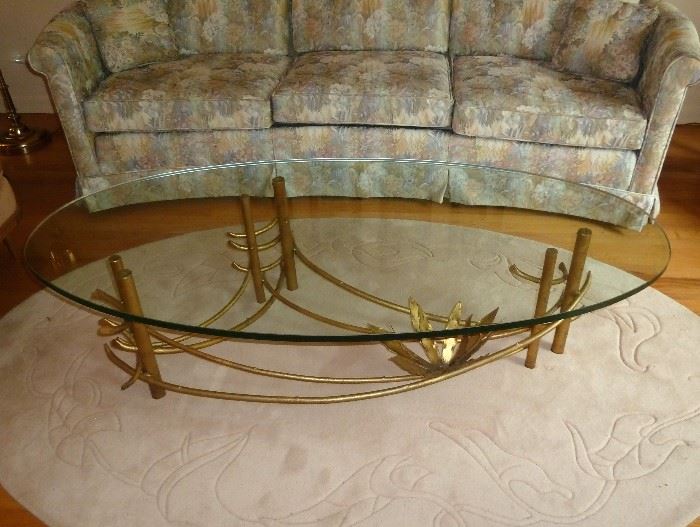 Awesome, Lotus Hollywood Regency oval glass top coffee table.  Gilded metal base with lotus flower, by Silas Seandel.  3/4" thick glass.