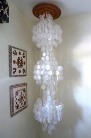 Retro (late 1960's-early 1970's) Triple tiered Capiz shell hanging lamp with wood ceiling mount, 3 lights.  It has blue lights in it now, but you can use any color you want.
