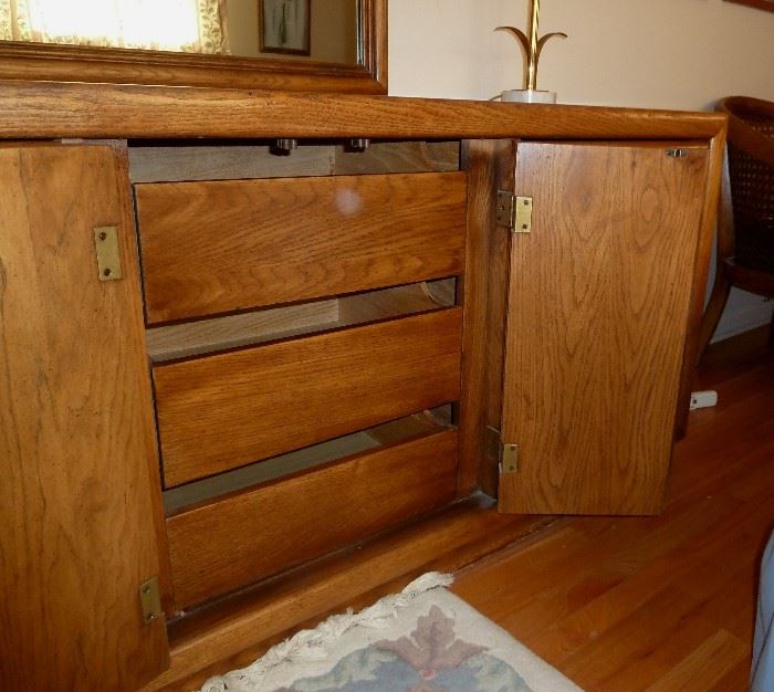 Solid wood triple dresser, 9 drawers (3 behind double doors), matching mirror.  68" wide
