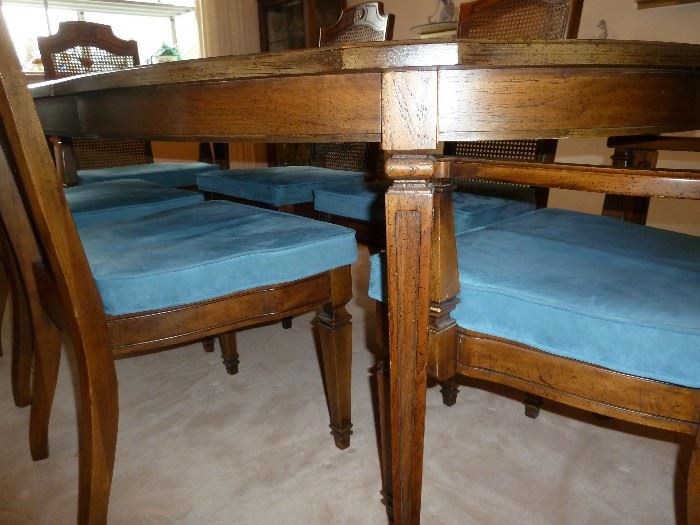 Stanley Furniture, solid wood dining table, with 18" leaf and six chairs with caned backs and blue velour cushioned seats.