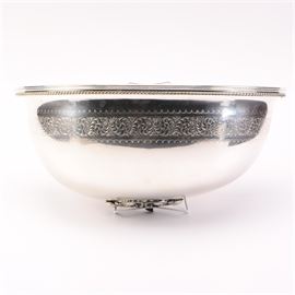 Silver Plate Wall Pocket: A silver plate wall pocket. This piece has a crescent shape with a reeded rim, gadroon trim, and an engraved band across the body of scrolled acanthus leaves and flowers, as well as two border waved lines. It is unmarked.