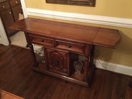 Buffet table with extension up. Would make a great bar station!