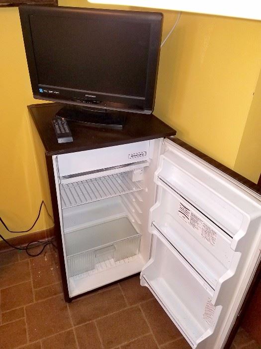 Mini fridge. Flat screen TV