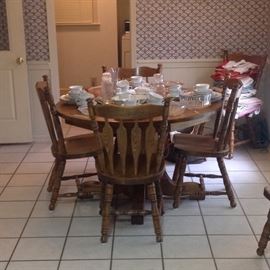  Solid oak kitchen table and six chairs 