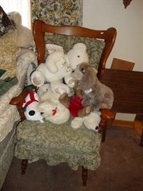 Upholstered wooden chair; stuffed animals