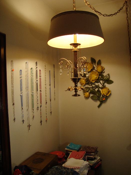 Rosaries, 70s swag lamp, floral wall decor