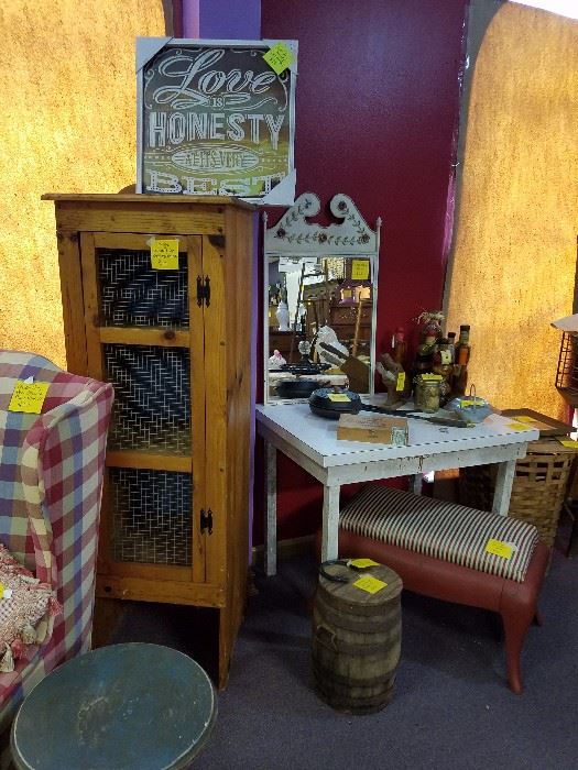 Cast iron stove base made into bench, old barrel, chicken wire cabinet, and many other great items.