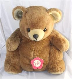 Homer - 317. Daekor - Saks Fifth Avenue. Plush -  Lt. brown with cream. 15" H in fair condition.  Snuggly pot-belly bear. Hang tag-paper flower  (take me home) from Saks Fifth Avenue. Condition:  He needs some work, seams undone on back of head
