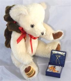 Algy-302, Merrythought-England in white and brown  mohair.  Walt Disney World Teddy Bear Convention  II.  White bear has a chocolate mohair bear back  pack with map to the Disney World Teddy Bear  Convention.  Has a  British Teddy Bear pin.
