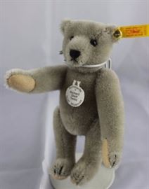 Steiff Teddy Bear - Richard Steiff Mini-107 Mohair-gray/flannel-light tan.  Jtd. grey mohair  bear with light tan flannel paw pads.  Wears white  historic chest tag, "Richard Steiff Teddy". Size:  6"

