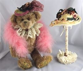 Deanna-259. Joan Woessner-Bear Elegance. In  mohair-brown & tapestry standing at 12" H in  excellent condition. 1992- Teddy Bear  Classic-Disney Land Convention. She is pellet  filled. Wears a lace neck ruff-fancy hat with pink
