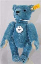 Steiff Teddy Bear - Teddy Blue, 1908-Mini-148.   Has w white historic chest tag, "Teddy 1908". Size:  7" H Excellent condition.
