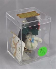 Little Gem Teddy Bear - Kris & Kringle (Xmas)  Mini-519 In the box, velvet plush-black/white.  1995  Christmas comes in clear acrylic box, with tag and  wooden heart stand.  Small bear with felt holly
