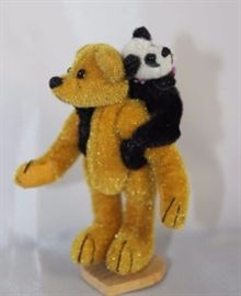Bosworth & Chi Chi (panda)-227.  Friends  Collection from Little Gem Teddy Bear.  Panda  hangs on a bear standing on a small heart stand. Size:  3" H Excellent condition.
