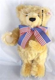 Friends Forever (Pince-Nez)-579 Bow Tie Bear.   Issued to celebrate the 140th Anniversary of  Theodore Roosevelt's birth.  It is a replica of  the oldest bear in the Steiff archives.  He wears  pince nez spectacles of a ribbon.  Has a ribbon
