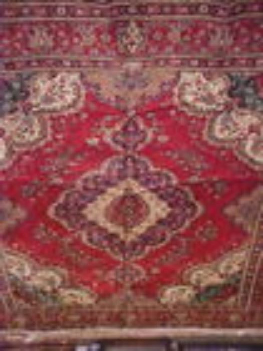 Several various colors & sizes Persian rugs.