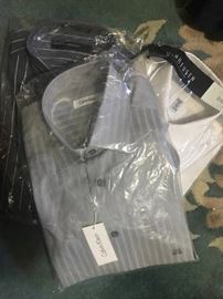 Men shirts and slacks still with tags