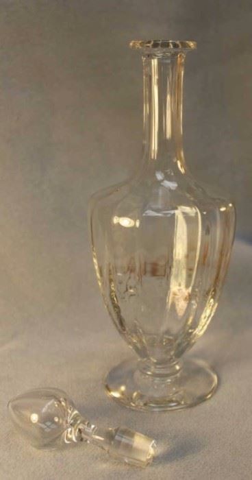 Baccarat crystal decanter with hollow blown  stopper. Size:  13.5" H x 4" W
