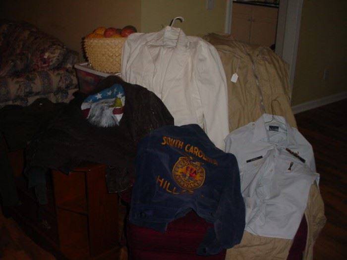An assortment of old Air Force, Navy and other jackets, and uniforms