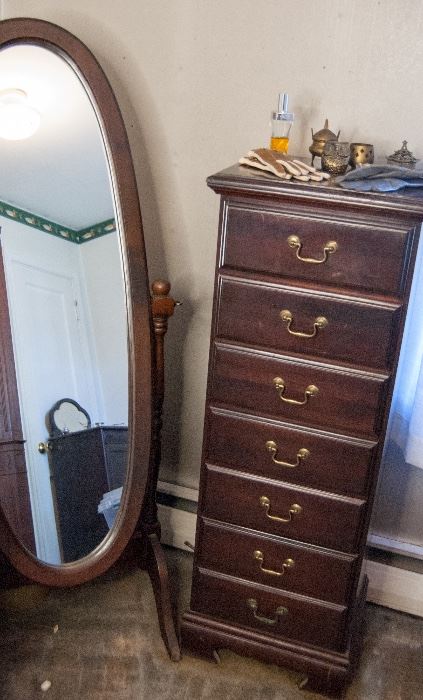 Oval floor mirror and lingerie chest