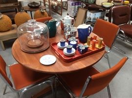 Small round teak dining table