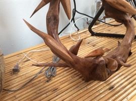 Wood bird in tree sculpture