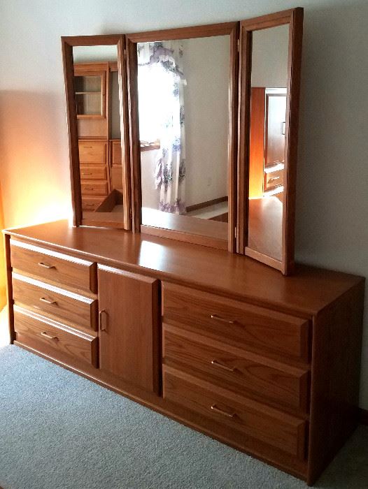 Triple dresser with three mirrors