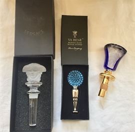 Glass bottle stoppers from (L to R) Versace, Va Bene and Faberge.
