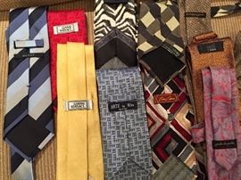 Men's designer ties (dozens!!).  Names include Versace, Gucci, Donna Karan and others