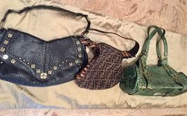 Designer purses including Coach and Fendi