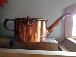 Antique copper pitcher