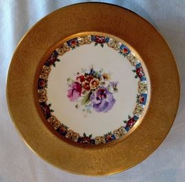 Set of six unmarked gold rim plates
