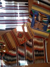 American Indian blankets and a table runner in the Indian pattern