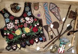 American Indian beaded items, quirts, war clubs and three pieces hand crafted metal tools