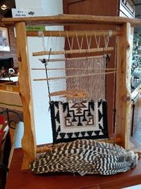 Smaller modern loom and hawk feathers