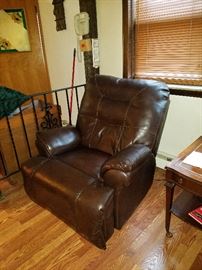 One of two leather recliners