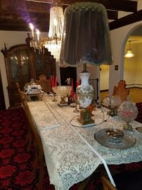 10 foot dining table w/8 chairs and 2 leaves makes it even longer