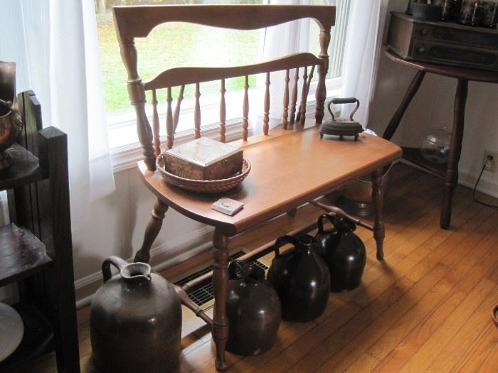 bench & brown stoneware jugs