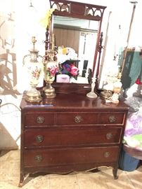Antique dresser with decorative mirror 