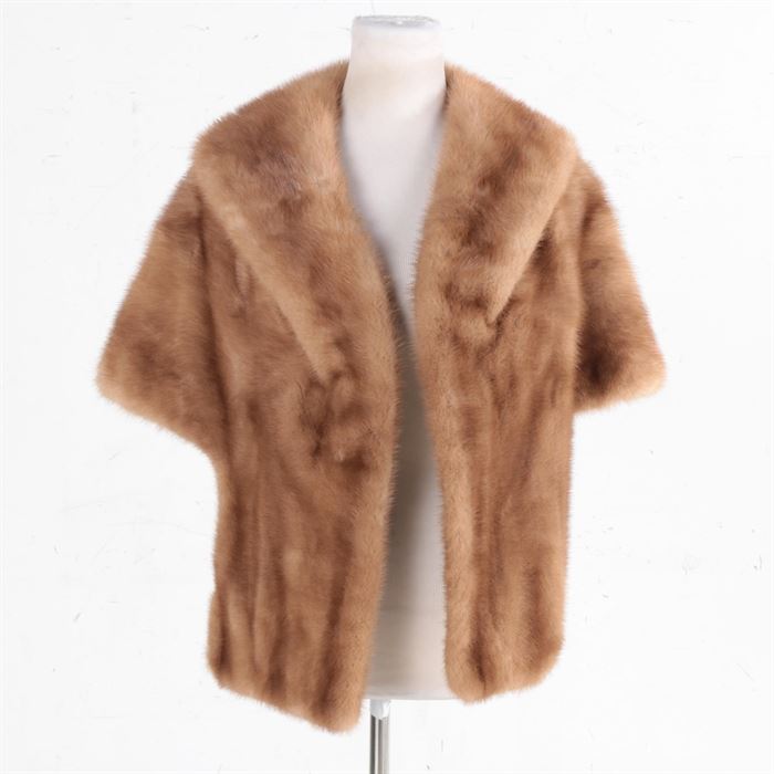 Women's Vintage Mink Fur Stole: A women’s vintage blonde mink stole by Canada Majestic Mink. This stole features a shawl collar, inseam pockets and a taupe satin lining. A cloth label and monogram have been sewn into the lining.