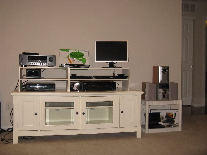 Riverside Senond Flat TV Stand, Sony 5 CD Changer -RCD-W500C, Sony Blu-Ray Disk Player, TiVo Roamio OTA , Panosonic Portable DVD/CD Player, Dell Computer Screen
