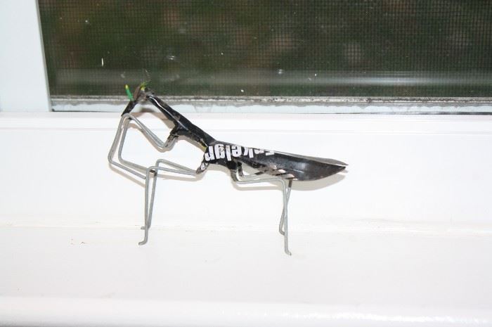 Metal praying mantis.  This one can't jump on you!