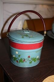 Great metal tin with handle and lined inside