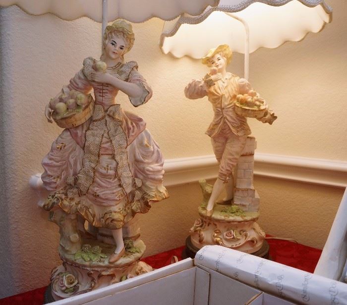 Pair of figural porcelain lamps