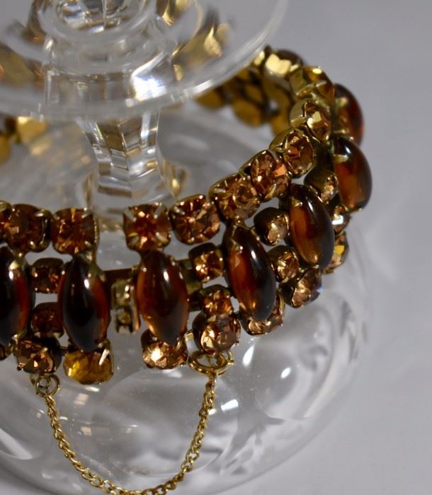 Amber glass and paste rhinestone bracelet in gold wash. Purchase now at: www.manorbornestatesales.com