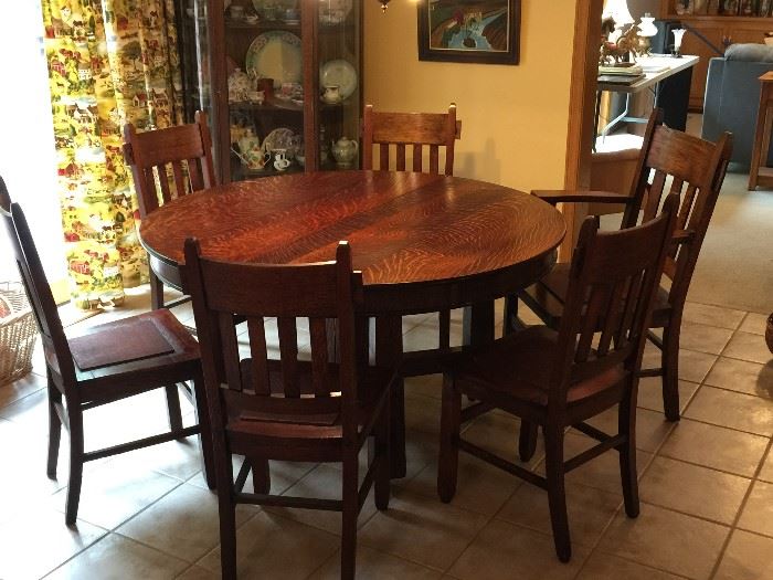 Antique mission table with 6 chairs and 4 leaves