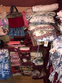 BRAND NEW LINENS, BEDDING, TOWELS, BATH RUGS, SEAT CUSHIONS AND MORE
